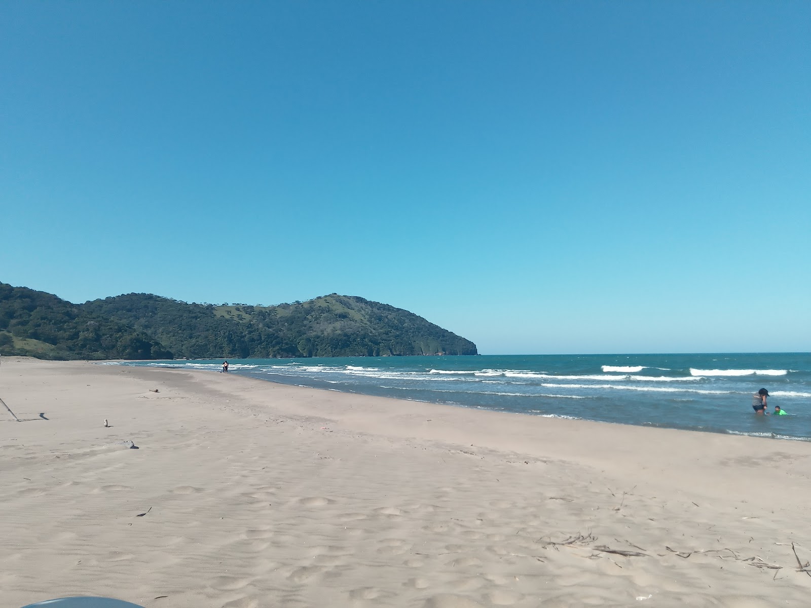 Foto von Playa Fantasma mit heller sand Oberfläche