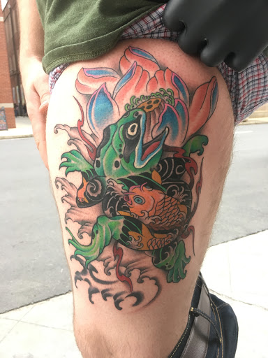 Explore female arm sleeve tattoo ideas, creative tattoo ideas in Erie, available at Wayward Tattoo Studio