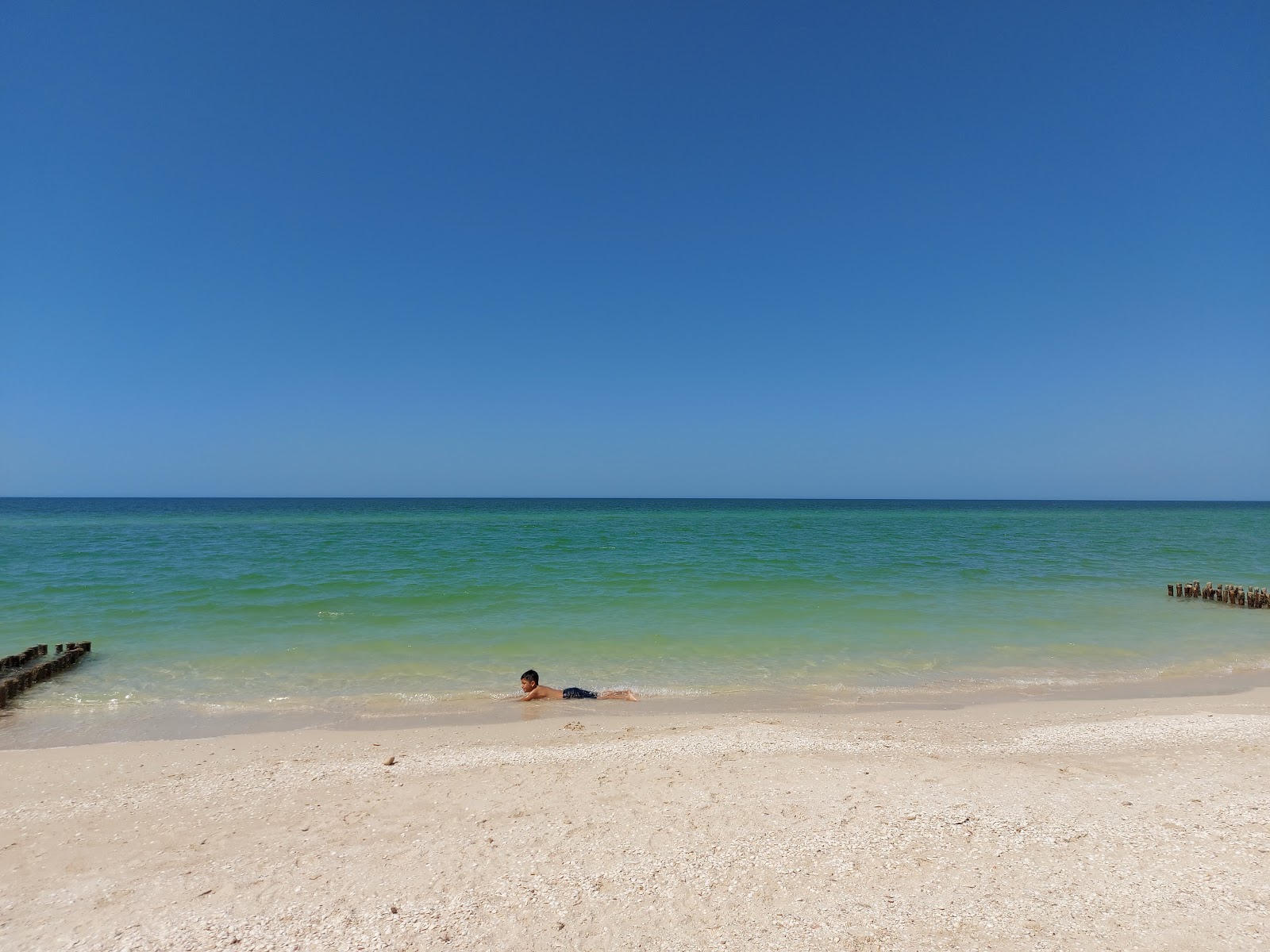 Foto av Playa Chuburna Puerto med turkosa vatten yta
