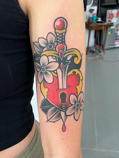 Explore cliff tattoo ideas, creative tattoo ideas in Chapel Hill, available at Golden Falcon Tattoo and Piercing