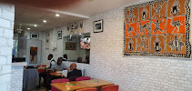 Atmosphère du Restaurant africain Amon Rfk Appolinaire à Évry-Courcouronnes - n°2