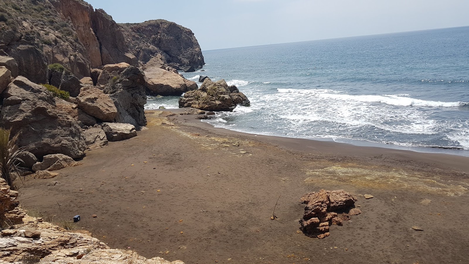 Fotografija Cola del Caballo z rjavi pesek površino