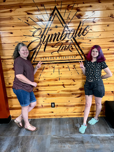 Explore tattoo filling ideas, creative tattoo ideas in Foley, available at Symbolic Ink Tattoo Studio