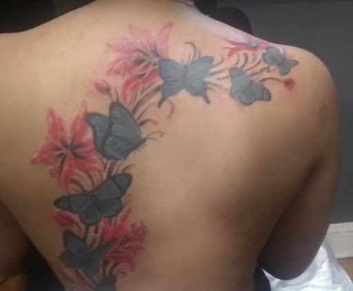 Explore upper leg tattoo ideas, creative tattoo ideas in Painesville, available at INKD Tattoos & Piercings