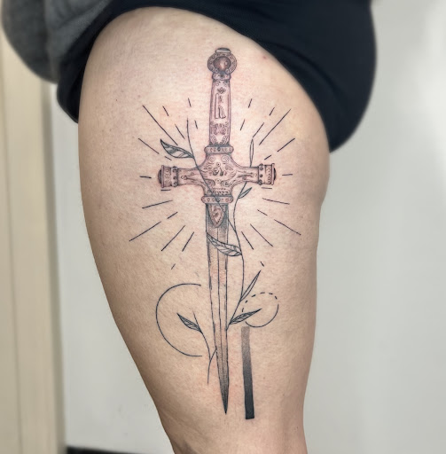 Explore annabelle tattoo ideas, creative tattoo ideas in Wilmington, available at Rogue Tattoo Studio