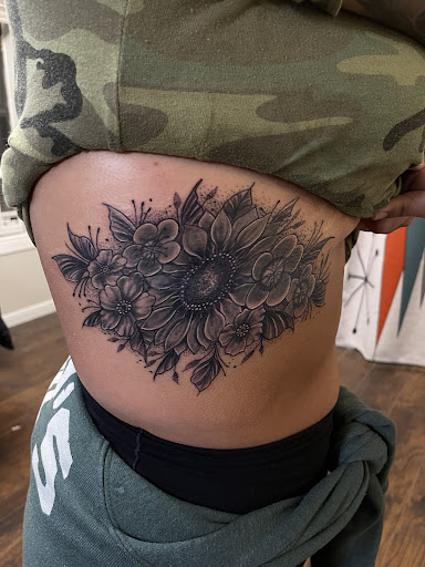 Explore be strong tattoo ideas, creative tattoo ideas in Magnolia, available at Lucky Sparrow Tattoo Shop and Piercing