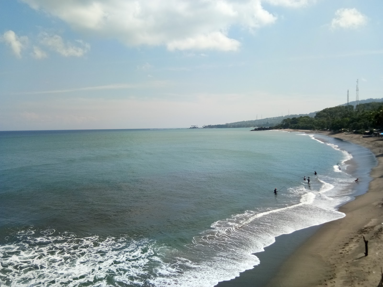 Fotografija Montong Beach z turkizna čista voda površino