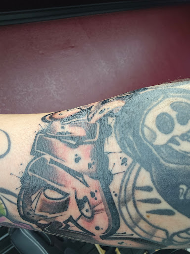 Explore hustle tattoo ideas, creative tattoo ideas in Apple Valley, available at Saints X Sinners Tattoo