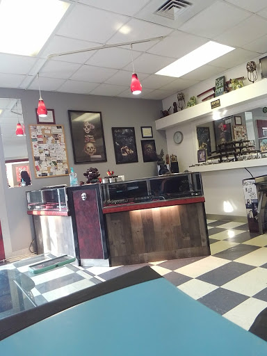 Tattoo Shop «Aacross The Skin Tattoo Studio», reviews and photos, 996 Patton Ave, Asheville, NC 28806, USA