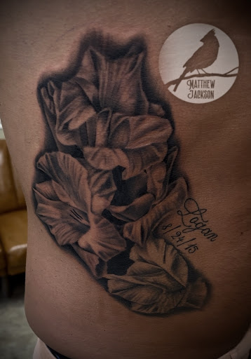 Explore fine line spine tattoo ideas, creative tattoo ideas in Nashville, available at RedBird Tattoo