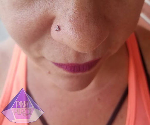 Find feminine skull tattoo ideas for your next unique tattoo in Winter Haven at Pinkys Place Winter Haven