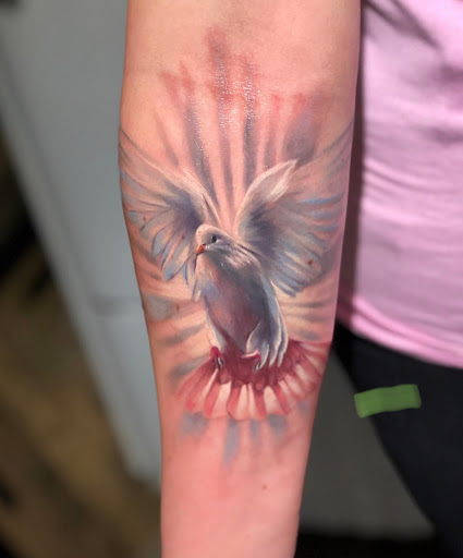 Explore men's ring tattoo ideas, creative tattoo ideas in Dayton, available at Aisle 9 Tattoo