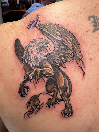 Explore thyroid tattoo ideas, creative tattoo ideas in Adrian, available at Good Life Tattoo Co.