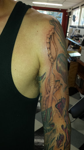 Tattoo Shop «Ink Slingers», reviews and photos, 1355 E Kearney St, Springfield, MO 65803, USA