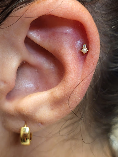 Explore mens behind the ear tattoo ideas, creative tattoo ideas in Scottsdale, available at Club Tattoo