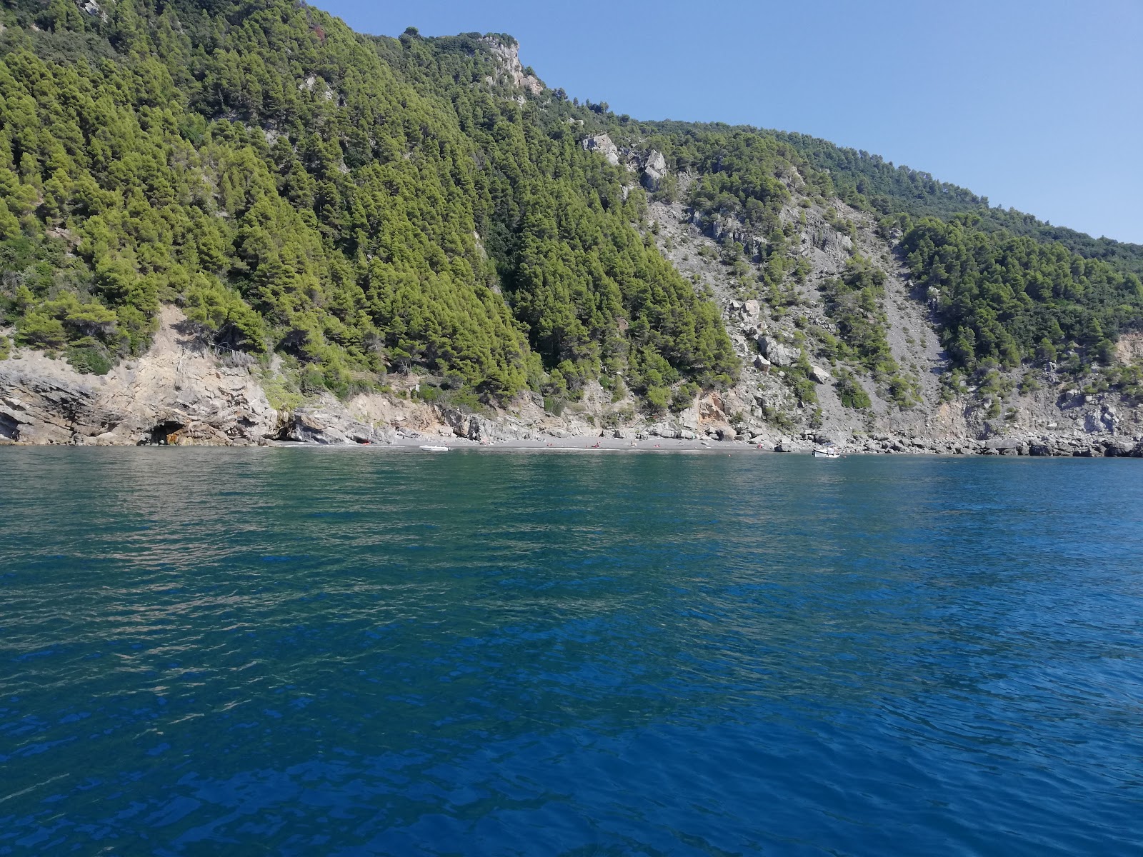 Photo de Spiaggia del Nacche avec l'eau bleu de surface