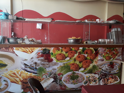 مطعم حمص العاديه
