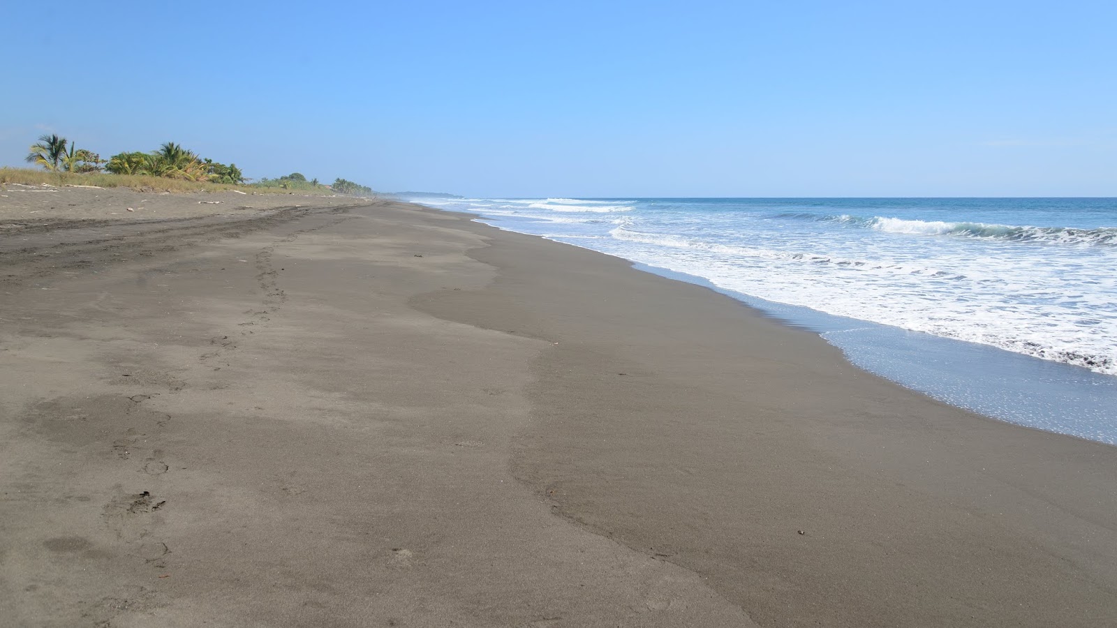 Photo de Playa Hermosa avec un niveau de propreté de partiellement propre