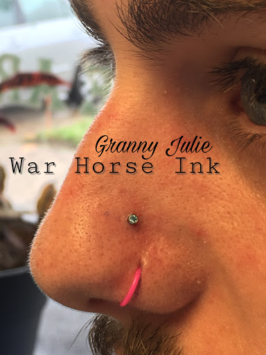Explore black female tattoos ideas, creative tattoo ideas in Kent, available at War Horse Ink