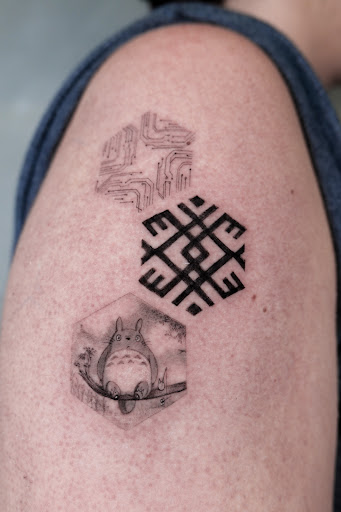 Explore cat tattoo ideas, creative tattoo ideas in Los Angeles, available at Ethos Art Haus Tattoo