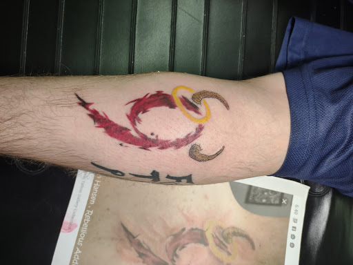 Explore brothers tattoo ideas, creative tattoo ideas in Williamston, available at Inkd Tattoo Parlor