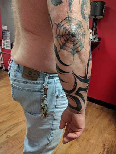 Explore little ghost tattoo ideas, creative tattoo ideas in Akron, available at Knuckle Up Ink Tattoos