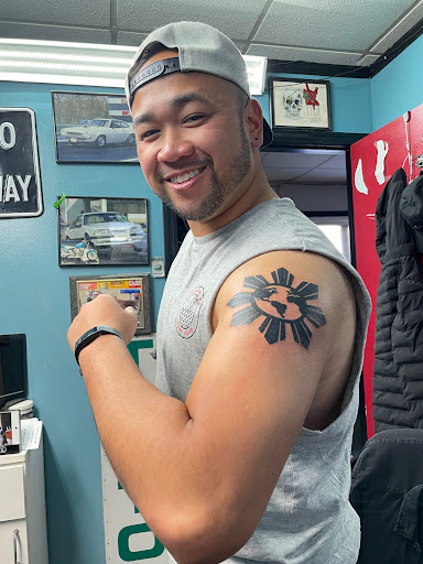 Find underboob tattoo ideas for your next unique tattoo in Bloomfield at Tattoo Garage