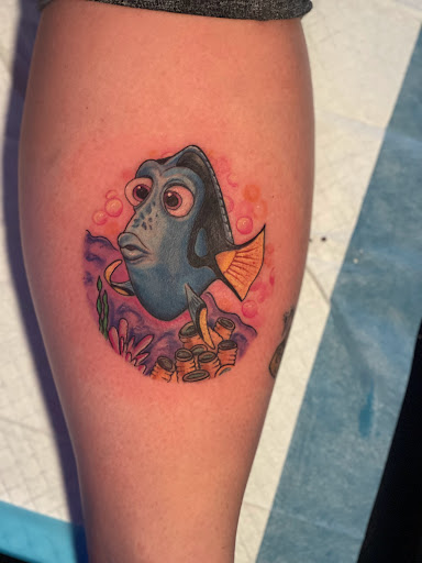 Explore feather tattoo ideas for men, creative tattoo ideas in Donora, available at Alchemy Arts Tattoo & Permanent Makeup Studio