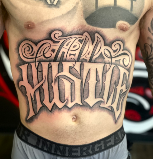 Explore blackout sleeve tattoo ideas, creative tattoo ideas in Silver City, available at Independent Ink Tattoo