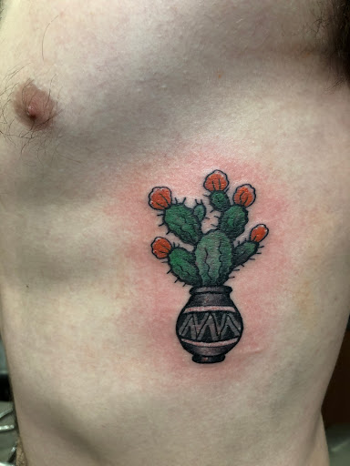 Find owl tattoo ideas for guys for your next unique tattoo in Duluth at Gitchee Gumee Tattoo