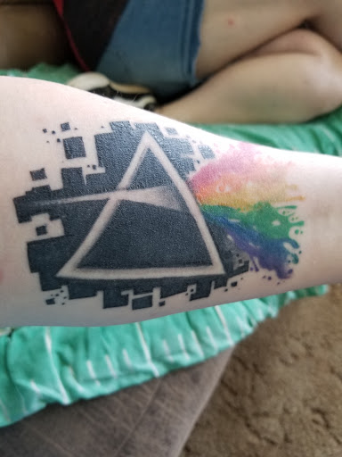 Explore red string of fate tattoo ideas, creative tattoo ideas in Middletown, available at Inkcredible Tattoo & Art Venue