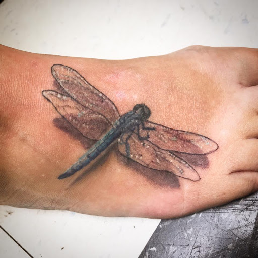 Find best travel tattoo ideas for your next unique tattoo in Milwaukee at Bay Street Tattoo Co.