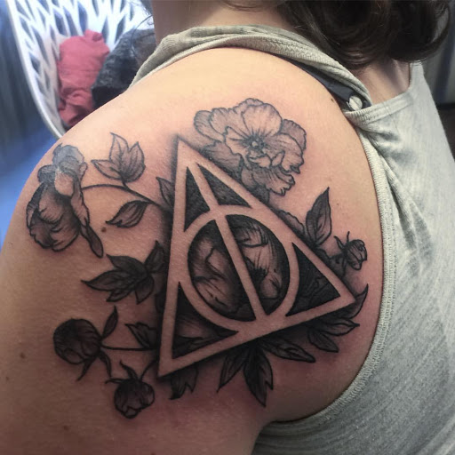 Explore simple fish tattoo ideas, creative tattoo ideas in Milwaukee, available at Samantha Weeks Tattoo Artist by appointment only