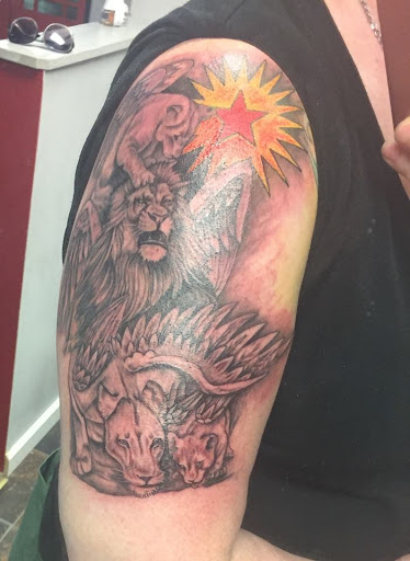 Explore wrap around tattoo ideas, creative tattoo ideas in Louisville, available at TRUTHS TATTOOS