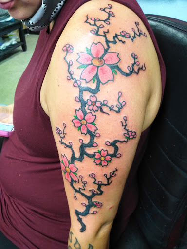 Find pubic tattoo ideas for your next unique tattoo in Cranston at Kabloom Tattoo Studio