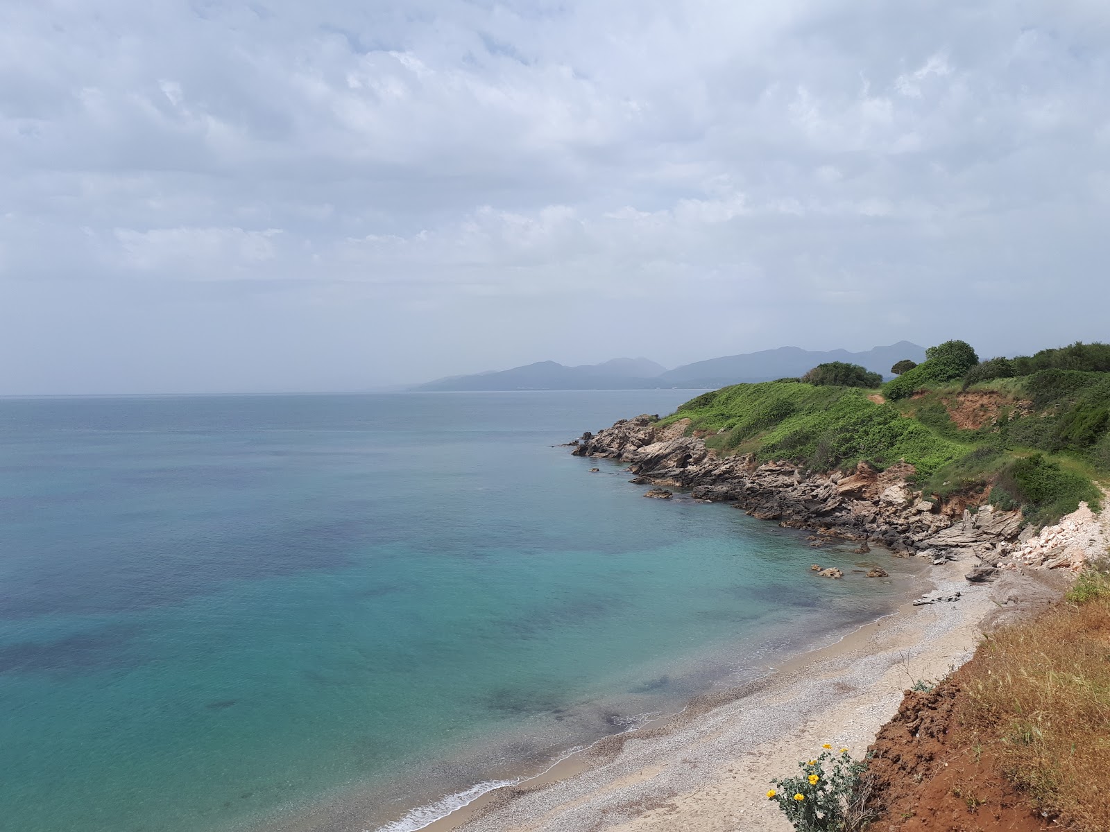 Faros beach'in fotoğrafı açık yeşil su yüzey ile