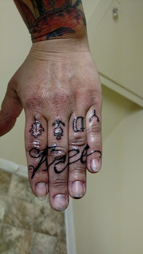 Tattoo Shop «AWOL Custom Tattooing Llc», reviews and photos, 1780 W Sherman Blvd, Muskegon, MI 49441, USA