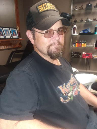 Find simple cat tattoo ideas for your next unique tattoo in Reedsville at Rock Shop Tattoos