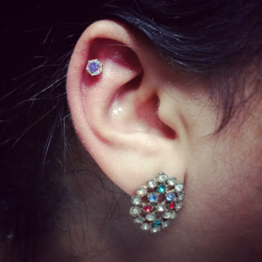 Explore disney thigh tattoo ideas, creative tattoo ideas in Oswego, available at Bodified