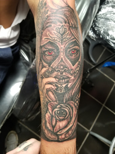 Explore cash tattoo ideas, creative tattoo ideas in Erie, available at EliKingInk