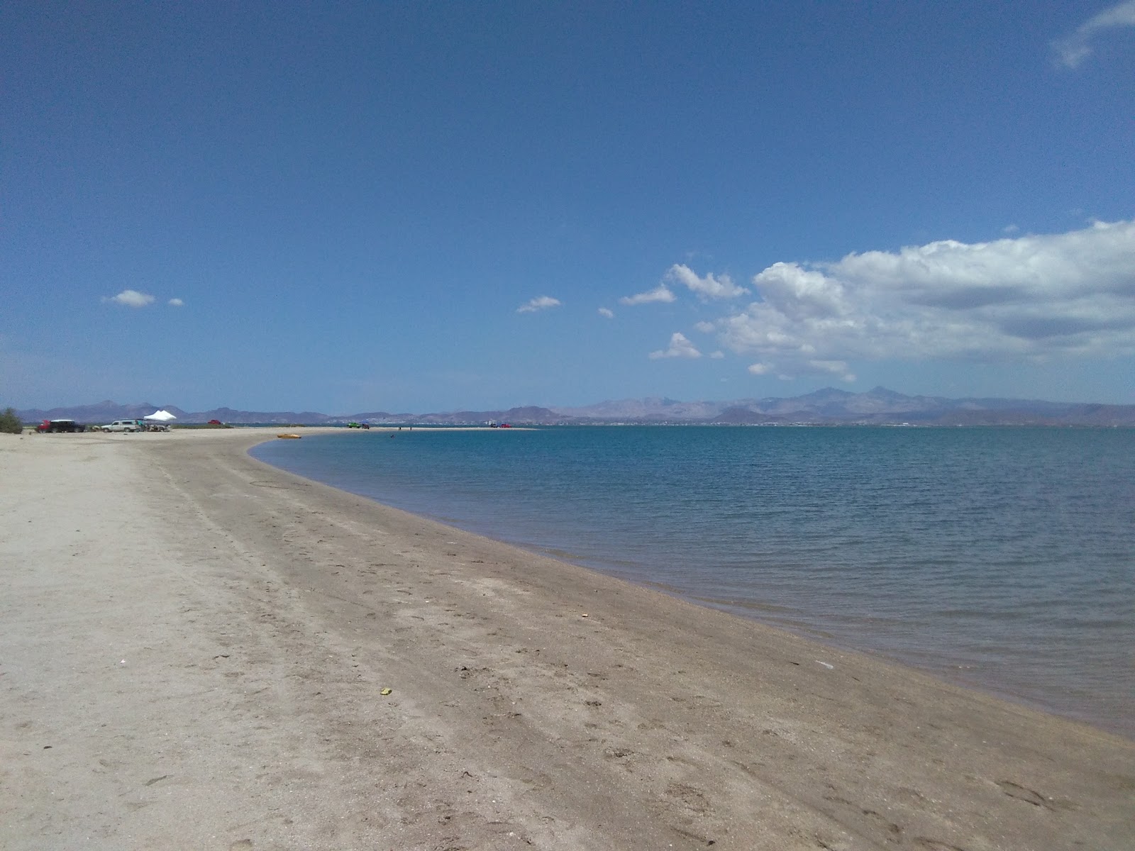 Fotografija Playa El Comitan z svetel pesek površino