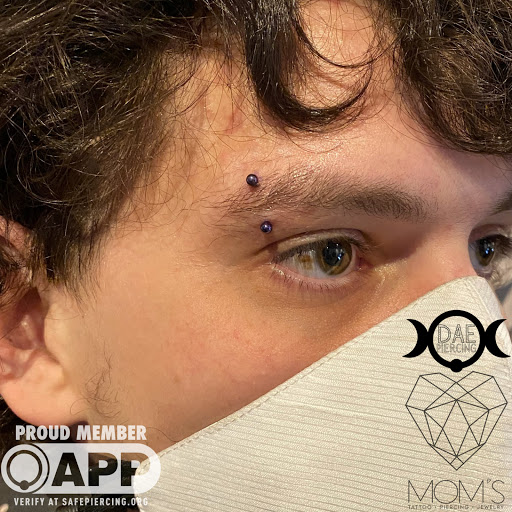 Find best name tattoo ideas for your next unique tattoo in Spokane at Moms Custom Tattoo & Body Piercing