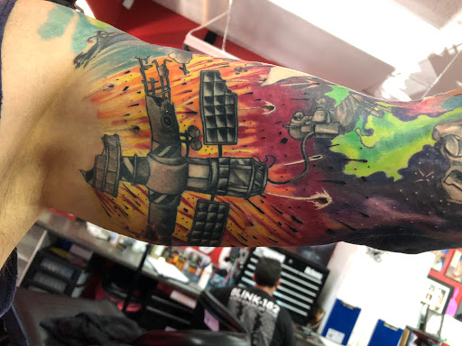 Explore hippy tattoo ideas, creative tattoo ideas in Largo, available at Alchemy Tattoos and Body Piercings