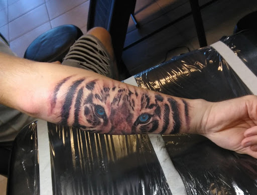 Explore zodiac tattoo ideas for men, creative tattoo ideas in Saint Petersburg, available at Ink Godz Tattoos