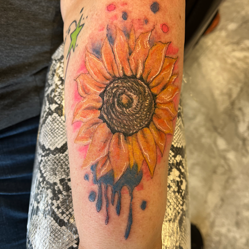 Explore tattoo ideas for forearm, creative tattoo ideas in Seymour, available at American Gypsy Tattoo Corp.