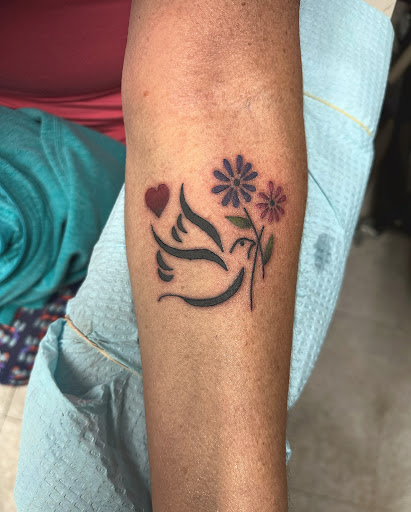 Explore tattoo ideas for grandson, creative tattoo ideas in Hudson Falls, available at ALTERED ADDICTION TATTOOS