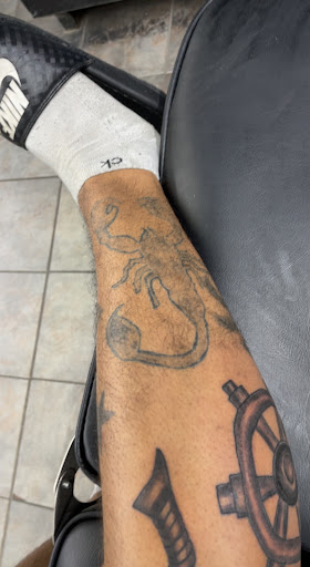 Tattoo Shop «Shrunkin Head Tattoo», reviews and photos, 4438 St John Ave, Kansas City, MO 64123, USA