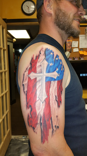 Explore route 66 tattoo ideas, creative tattoo ideas in Foley, available at Black Sheep Custom Tattoos and Piercings