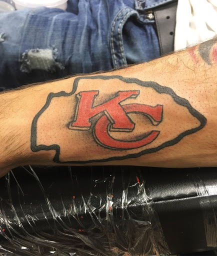 Explore literary tattoo ideas, creative tattoo ideas in Kansas City, available at Divine Tattoo Parlor