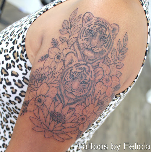 Explore church tattoo ideas, creative tattoo ideas in Fort Myers, available at Tiger Lotus Tattoo and Piercing